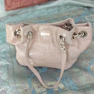 Kate Spade cream leather purse with gold hardware.